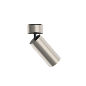Close-up of a modern white and black desk lamp against a black background, showing the cylindrical shade and arm.