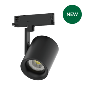 Close-up of a black studio spotlight on a stand with a green circular NEW badge nearby, advertising a new product.
